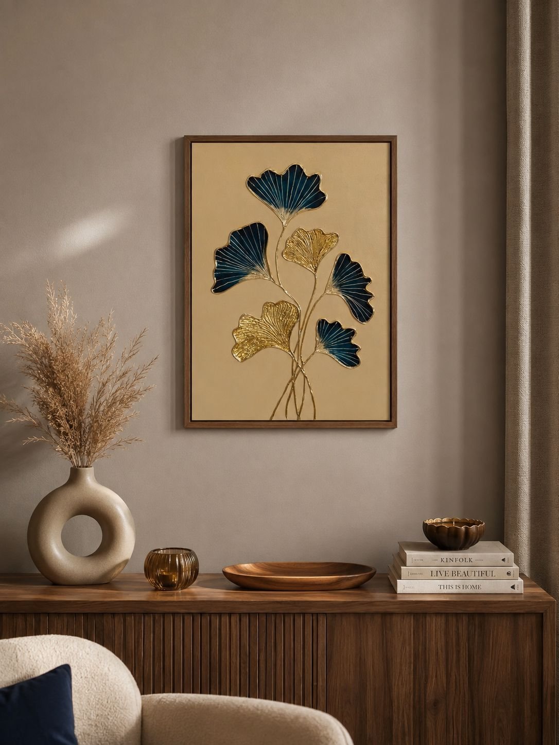 Blue and gold botanical artwork styled in a warm interior